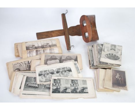 LATE NINETEENTH CENTURY STAINED WOOD SIMPLE HAND HELD STEREOSCOPIC VIEWER, with sliding card holder and fold down handle and 
