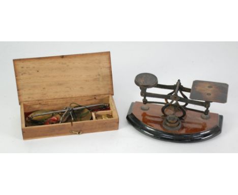 PAIR EARLY 20TH CENTURY APOTHECARIES STEEL AND BRASS PORTABLE SCALES in fitted box with set of gilt metal weights one to one 