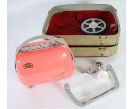 1950s ZEISS-IKON 'MOVILUX' PINK CASED PORTABLE CINE PROJECTOR in a                                                           