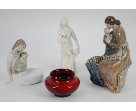 THREE MOTHER AND CHILD CERAMIC GROUPS comprising Royal Worcester cream glazed 'New Arrival' by Maureen Halson, 8 1/2" (21.6cm