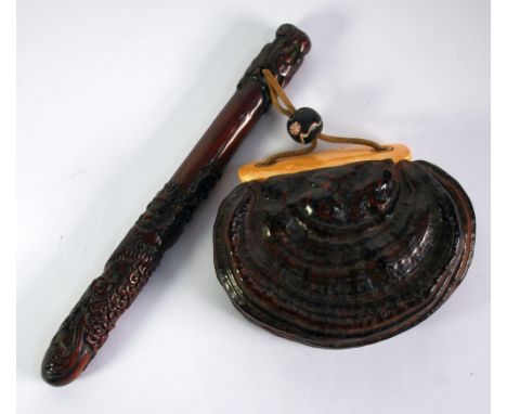 19th CENTURY JAPANESE TOBACCO POUCH made from a hollowed-out, naturally formed, wooden burr and having a lid secured by a lea