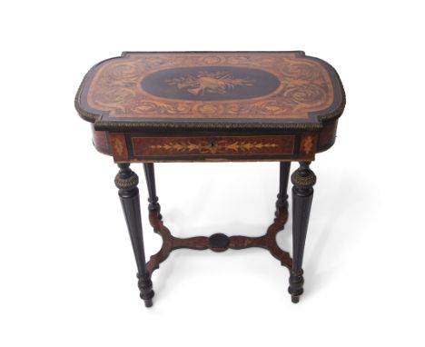 19th century burr walnut marquetry and ebonised sewing table, the ornately inlaid lid with brass edging enclosing a fitted in