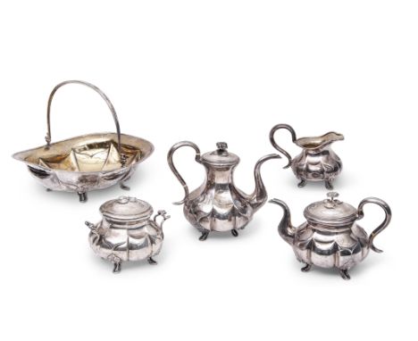 Extensive mid-19th century Russian silver tea and coffee service of panelled circular baluster form, each item standing on ca