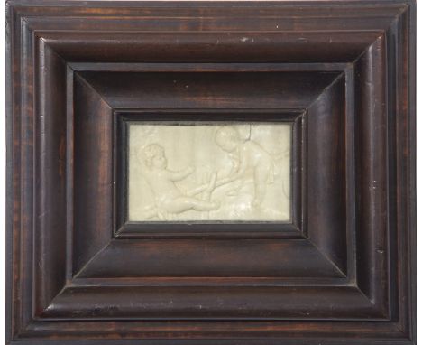 Ivory embossed concave plaque, 17/18th century, depicting two putti on a see-saw, 8 x 11.5cm