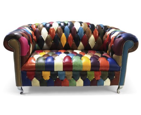 21st century designer Chesterfield arch back sofa, upholstered in multi-coloured leather harlequin design, with straight scro