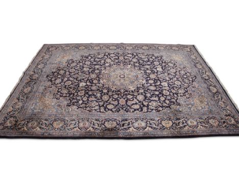 Late 20th century Caucasian style large carpet, triple gull border, central panel with large spreading floral rosette, mainly