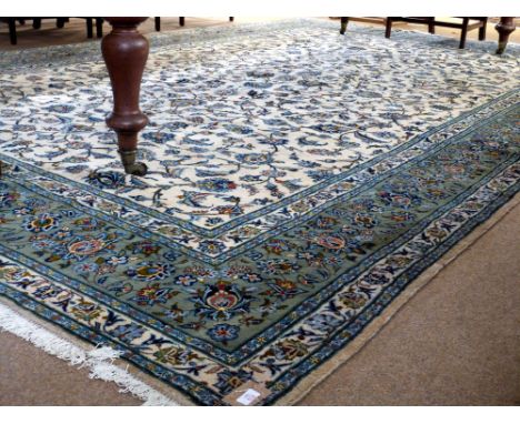 Good quality modern Kashan large carpet, multi-gull border, central panel of scrolling foliage, mainly beige, blue and pale g