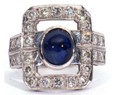 Sapphire and diamond dress ring, the carved open work rectangular panel centring an oval sapphire cabochon within a diamond s