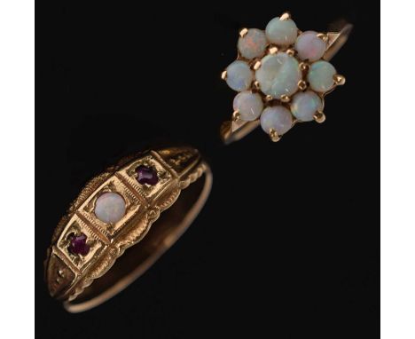 Opal flower head cluster 9ct ring, size H½ approx, 1.8g gross approx, and an opal and ruby 9ct gold ring, size P approx, 2.5g