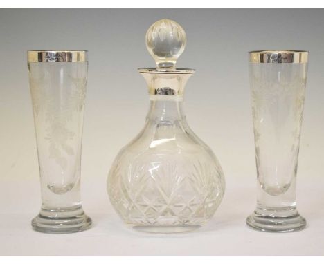 Elizabeth II silver mounted cut glass decanter, sponsor's marks of Hampton Utilities, Birmingham 1984, together with a pair o