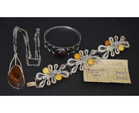 Baltic amber bangle and pendant, plus 'butterscotch' amber filigree panel bracelet (3)