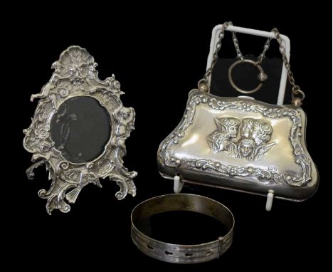 Edward VII silver purse decorated with 'Reynold's angels', Birmingham 1904, 11.5cm diameter, Elizabeth II cast silver rococo 