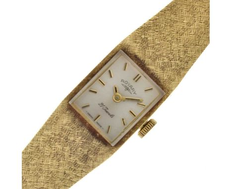 Rotary - Lady's 14k integrated bracelet watch, the square silvered dial with applied gilt baton hour markers and hands, signe