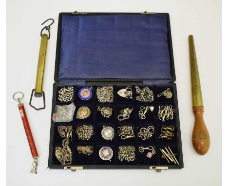 Case of silver and white-metal fobs, swivels, clips, etc together with vintage brass ring sizer, silver scales, etc