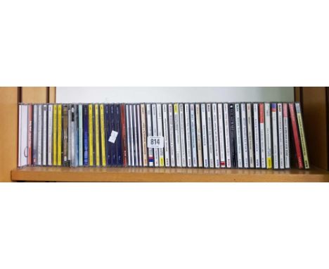 2 SHELVES OF VARIOUS CD'S, DVD'S AND 3 PLASTIC CD STORAGE UNITS