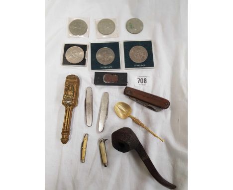 6 COMMEMORATIVE COINSNS, POCKET KNIVES, BRASS SET OF NUT CRACKERS, A SPOON AND BRIAR BARK PIPE BY PARKER