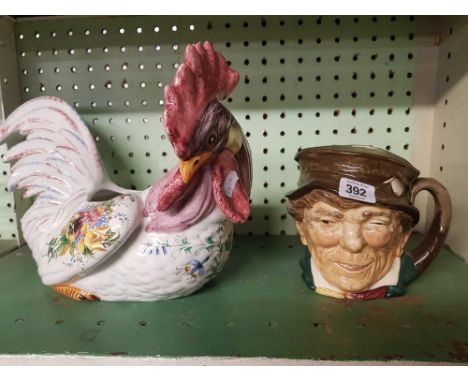 CERAMIC COCKEREL CROCK AND A DOULTON TOBY JUG 