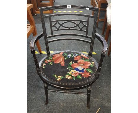 OVAL ANTIQUE ELBOW CHAIR WITH AN UPHOLSTERED TAPESTRY SEAT