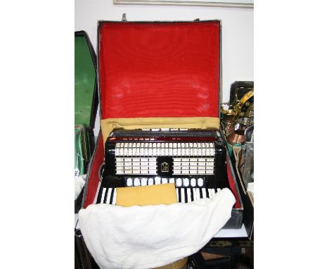 A CASED HOHNER PIANO ACCORDION, 'Polyphonic 400', in black