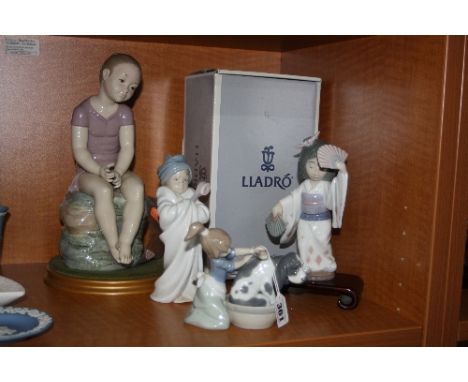 THREE LLADRO FIGURES AND A LARGE NAO FIGURE, (a/f), to include girl washing dog No.5455, boxed 'Oriental Dance' No.6230 and c