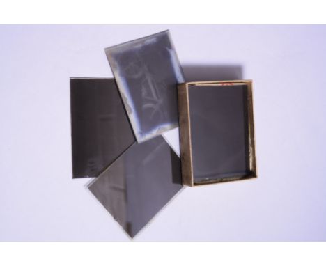 A BOX OF GLASS SLIDES, from WWI era depicting scenes etc, France, military, motor vehicles etc, for magic lantern style proje