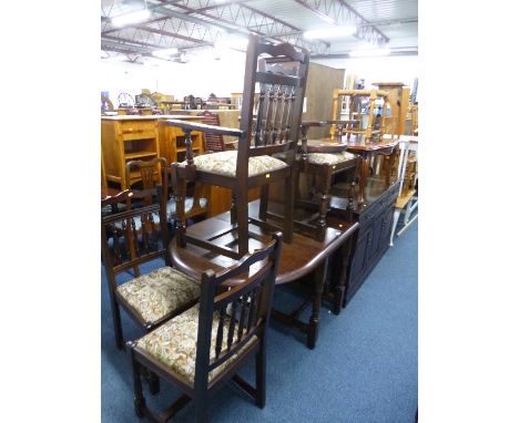 AN OAK GATE-LEG TABLE, and four chairs including two carvers and an oak sideboard with three drawers (6)