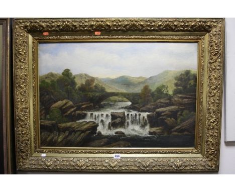 A GILT FRAMED LANDSCAPE PORTRAIT, bridge over river with waterfall, oil on canvas, unsigned, approximately 49.5cm x 73.5cm