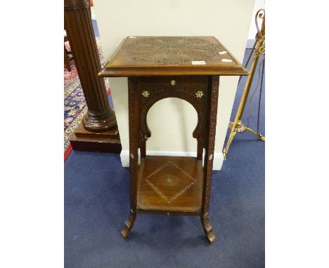 A CARVED HARDWOOD AND INLAID PLANT STAND, with lower shelf, approximate size height 81cm (sd, losses)