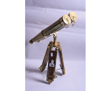 A LARGE BRASS AND UBODEN TRIPOD STYLE SPY GLASS, no makers marks evident but all complete with end caps etc