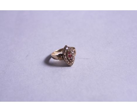 A 9CT VICTORIAN MARQUISE SHAPED DIAMOND AND RUBY RING, ring size M1/2, approximate weight 2.0 grams