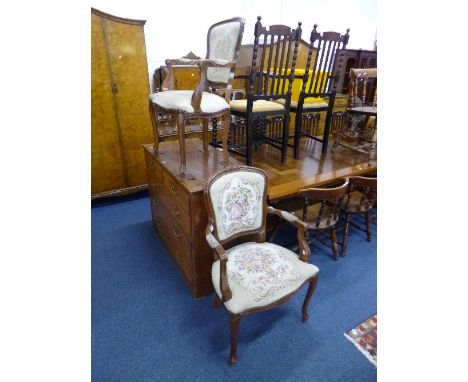 A PAIR OF FRENCH STYLE ARMCHAIRS, with carved frames and tapestry upholstery (one chair well used/faded)