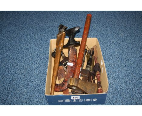 A BOX CONTAINING A NUMBER OF EASTERN/AFRICAN TOURIST STYLE PIECES, axe, daggers, knives etc (8)