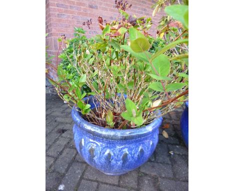 A LARGE BLUE GLAZED STONEWARE PLANTER, approximate diameter 48cm