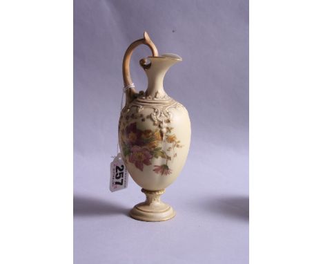 A SMALL ROYAL WORCESTER BLUSH IVORY EWER, florally decorated, with loop handle, shape No.11271, green factory mark to base, h