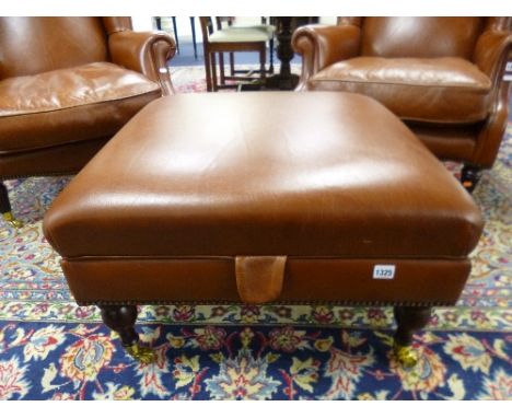 A 'LAURA ASHLEY' BROWN LEATHER STOOL, the lift up top with storage area, approximate size 68cm X 68cm