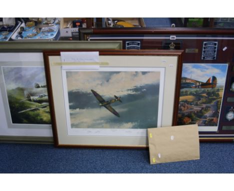THREE LARGE FRAMED PRINTS, glazed frames, titled 'After the Storm' 2004 Douglas Bader in Spitfire Pas-De-Calais, signed by te