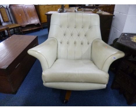 A 1960'S/70'S G-PLAN WHITE PVC BUTTON BACK SWIVEL CHAIR (sd)
