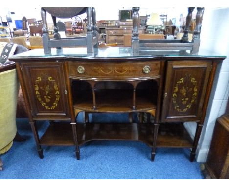 AN EDWARDIAN MAHOGANY INLAID AND SATINWOOD CROSSBBANDED SIDEBOARD/CABINET, the bowed centre section above open shelf flanked 