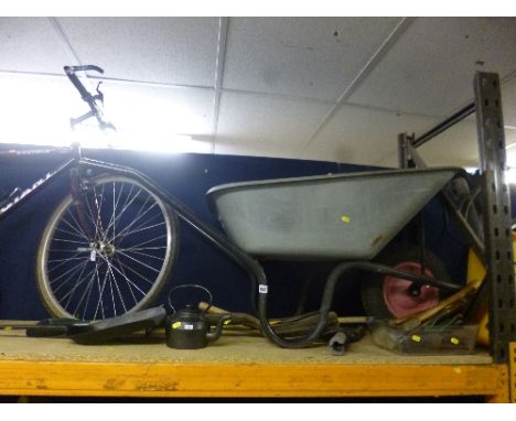 A METAL WHEELBARROW, and a quantity of hand/garden tools