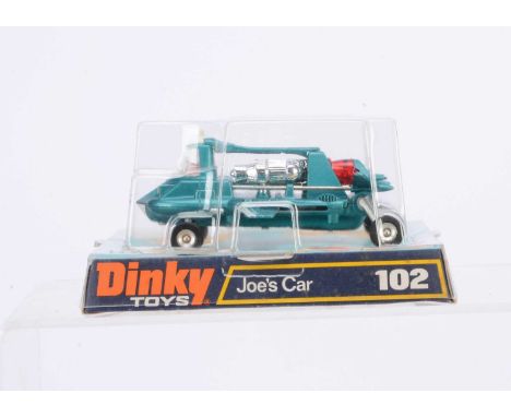 A Dinky Toys 102 Joe's Car From Joe 90, metallic green body, white flashes, red driver and engine thruster, battery powered, 