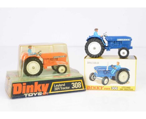 Dinky Toys 308 Leyland 384 Tractor, two examples, first orange body, white wheels, blue plastic driver, second dark blue body