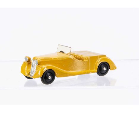 A Dinky Toys 38b Sunbeam Talbot Sports Tourer, yellow body, fawn tonneau, black hubs, silver edged windscreen, VG
