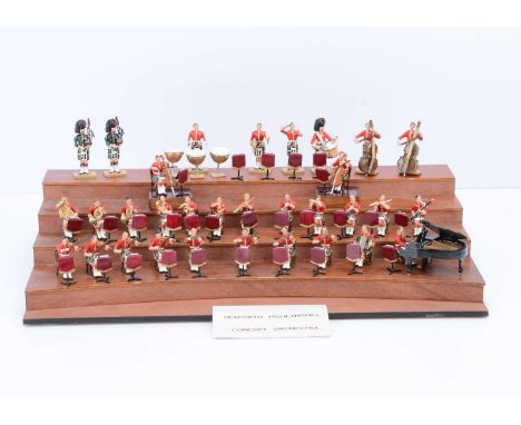 32 pce Seaforth Highlanders Concert Orchestra with a tiered wooden stage, standard 'Britains' 54mm scale loose figures, compl