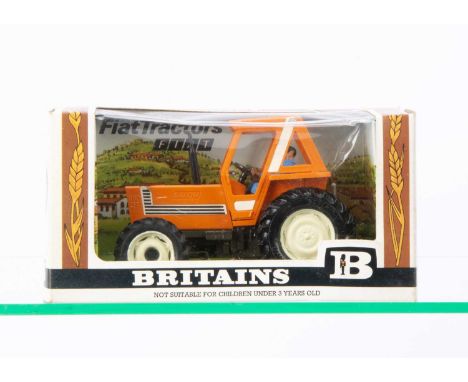 A Britains 1:32 Scale Fiat 880 Tractor No.9528, in original box, VG-E, box G-VG, slight denting to cellophane, no base fixing