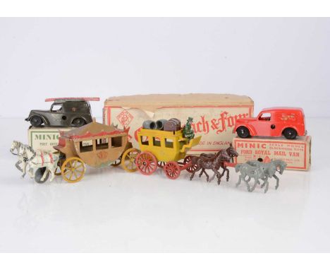 A Modern Product 'Ye Olde Coach & Four', c.1947, yellow mail coach with driver, trunk, barrels and four horses, two plastic c