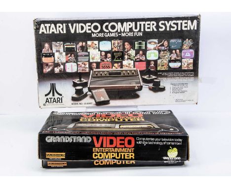 Atari CX-2600 U Light 6 Video Computer System, in original box with four cartridges (Combat, Space Invaders, Yars Revenge & P