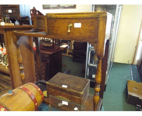 An Oak Stick Stand.
