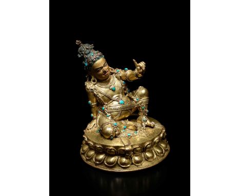 STATUETTE DE VIRUPA EN ALLIAGE DE CUIVRE DORÉTIBET, XVE/XVIE SIÈCLEInscribed in Tibetan along the rim of the base with dpal b