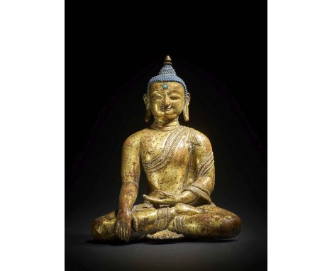 STATUETTE DU BOUDDHA SHAKYAMUNI EN ALLIAGE DE CUIVRE DORÉNÉPAL, POSSIBLEMENT KHASA MALLA, VERS XIVE SIÈCLHimalayan Art Resour
