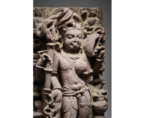 STATUE D'ARDHANARISHVARA EN GRÈS ROUGEMADHYA PRADESH, XE/XIE SIÈCLE65 cm (25 5/8 in.) highFootnotes:A RED SANDSTONE FIGURE OF